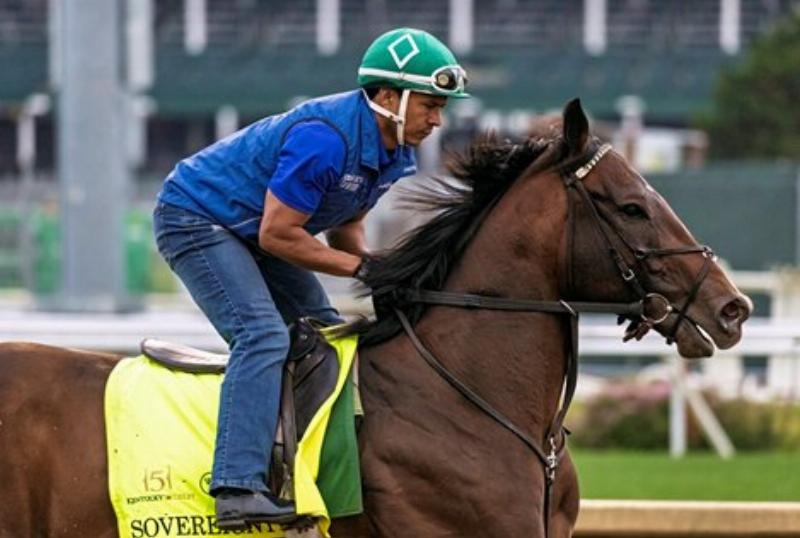 alt-text=American Pharoah winning the Kentucky Derby, jockey urging him forward