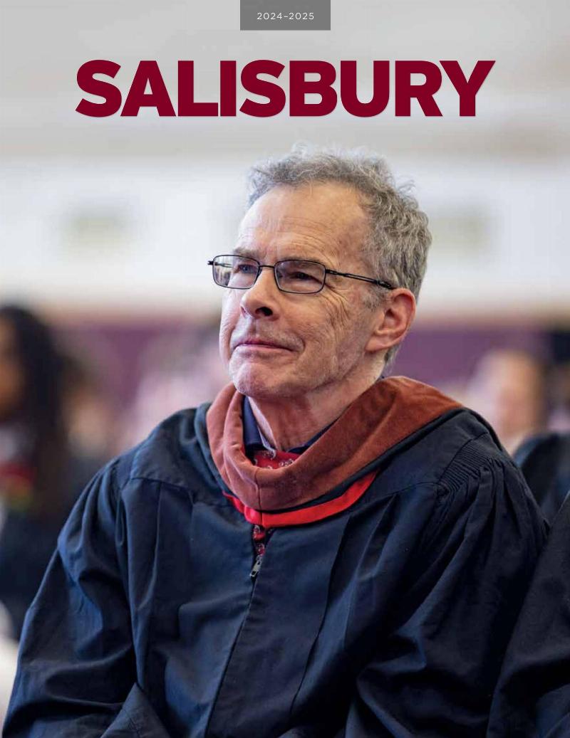 A seasoned horse trainer, Anthony Stabile, checking on a thoroughbred in its stall, showcasing his hands-on training philosophy.