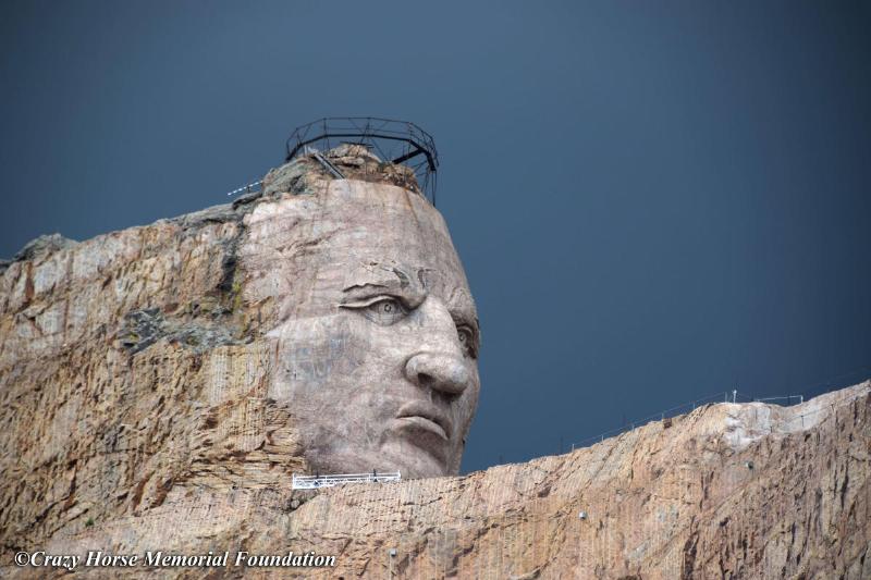Workers carving the stone on the Crazy Horse monument in the Black Hills