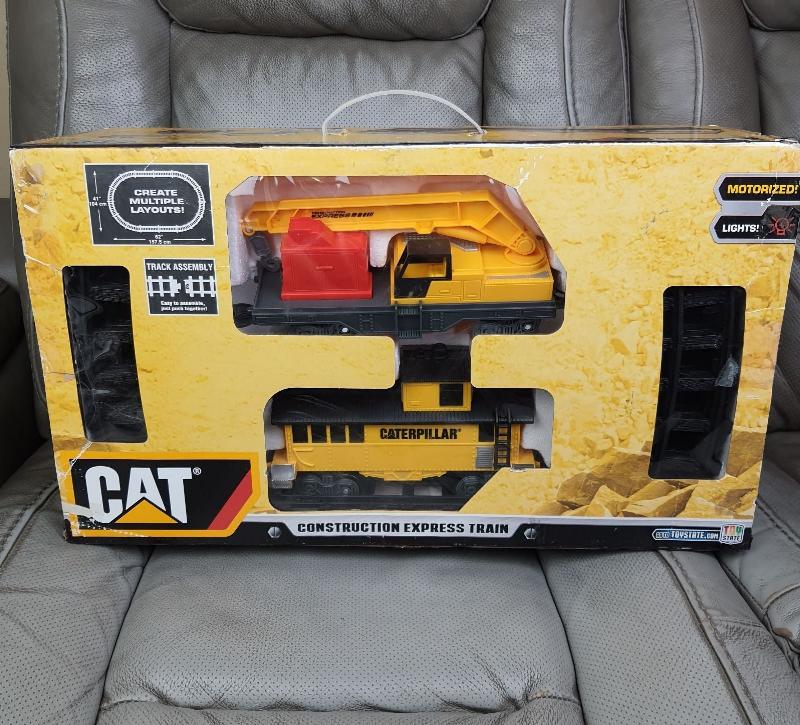 Detailed Cat Construction Express Train Set with figures and accessories