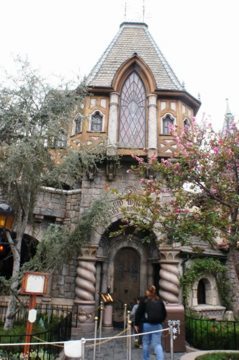 A happy child joyfully riding a Disney Toy Story Bullseye rocking horse in their bedroom.