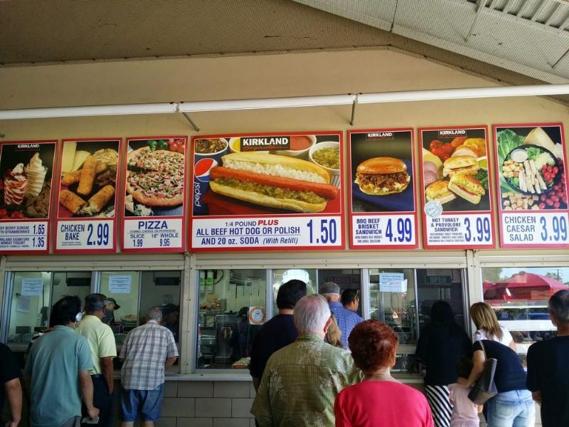 Shoppers enjoying a variety of affordable and delicious items at the Costco food court.