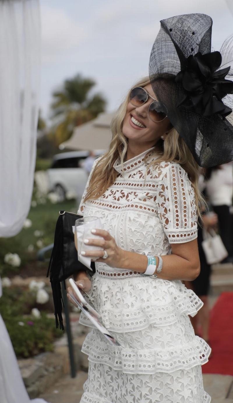 Stylish attendees showing off their fashion at the San Diego horse racing track on opening day