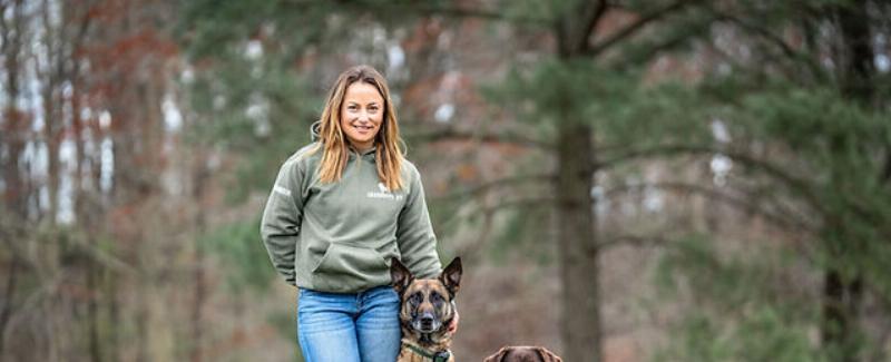 Professional dog training session in Elkton, MD park, focusing on obedience and positive reinforcement.