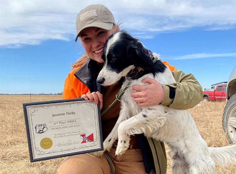 A happy dog and owner celebrating successful training in Wichita Falls