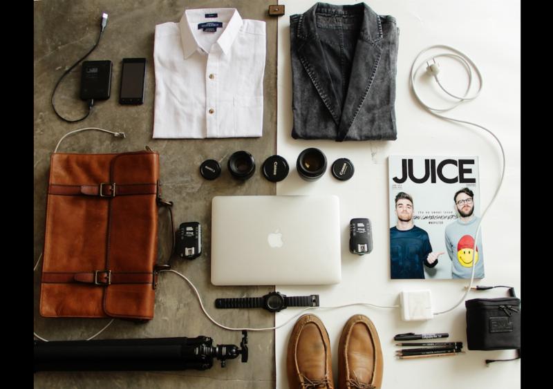 A polished wooden gavel resting next to an old, worn horseshoe on a dark background, symbolizing justice and regulation in the horse racing world.