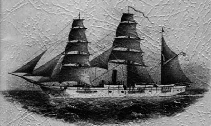 A fleet of ancient Greek ships with bronze shields on their sides, anchored on the beach before the imposing stone walls of the city of Troy at sunrise, conveying a sense of a long, drawn-out siege.