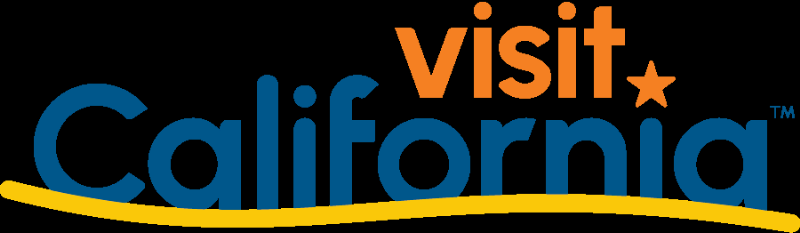 A close-up of the Horse Soldier Bourbon bottle, emphasizing the metallic, textured glass and the iconic soldier on horseback emblem, with a background hinting at both a rustic distillery and the American flag.