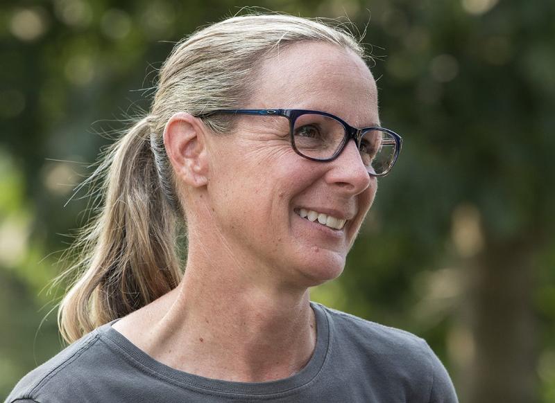 Arcangelo horse trainer Jena Antonucci sharing a quiet moment with the gray colt, showcasing their strong bond.