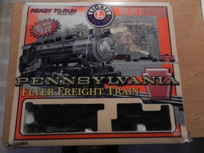 A detailed close-up of the vintage Lionel 0-8-0 steam locomotive from the Iron Horse set.