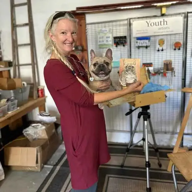 Madison Woods with Hugo and his puppy portrait.
