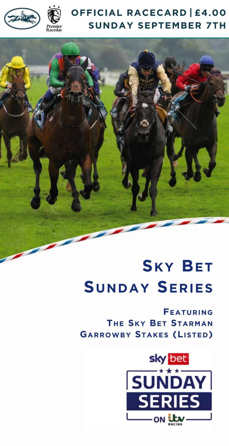 A seasoned Nigel Tinkler horse trainer observing a thoroughbred during morning gallops at his picturesque Woodland Stables.