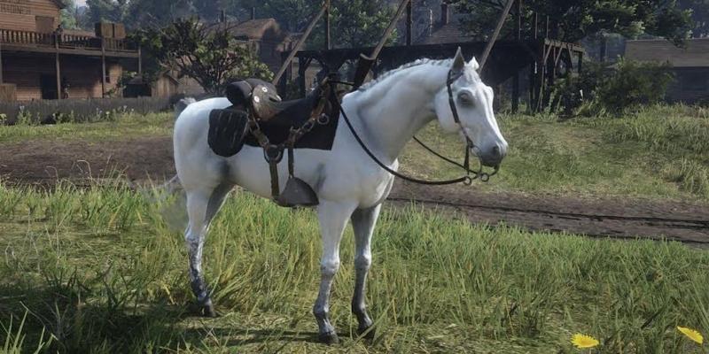 Arthur Morgan stands beside the best war horse in RDR2 story mode, a powerful dark bay Turkoman, against a rugged mountain backdrop.