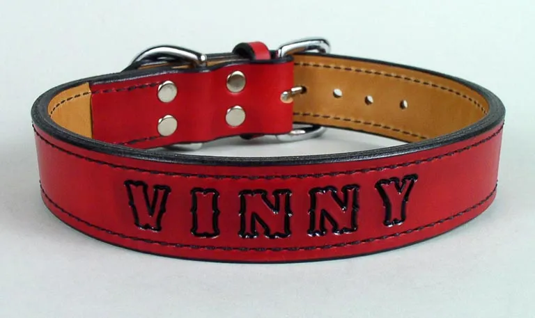 Red personalized leather dog collar with embossed lettering hand painted black.