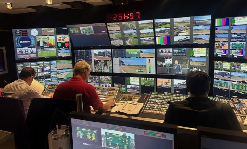 A thoroughbred horse rounds the final turn at Saratoga, the temporary home for the Belmont Stakes during the horse racing schedule Belmont transition.
