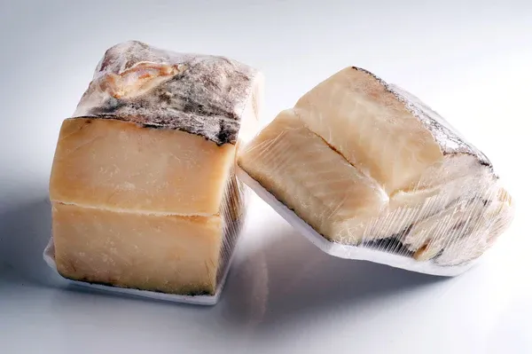 Several cod skin treats arranged on a surface.