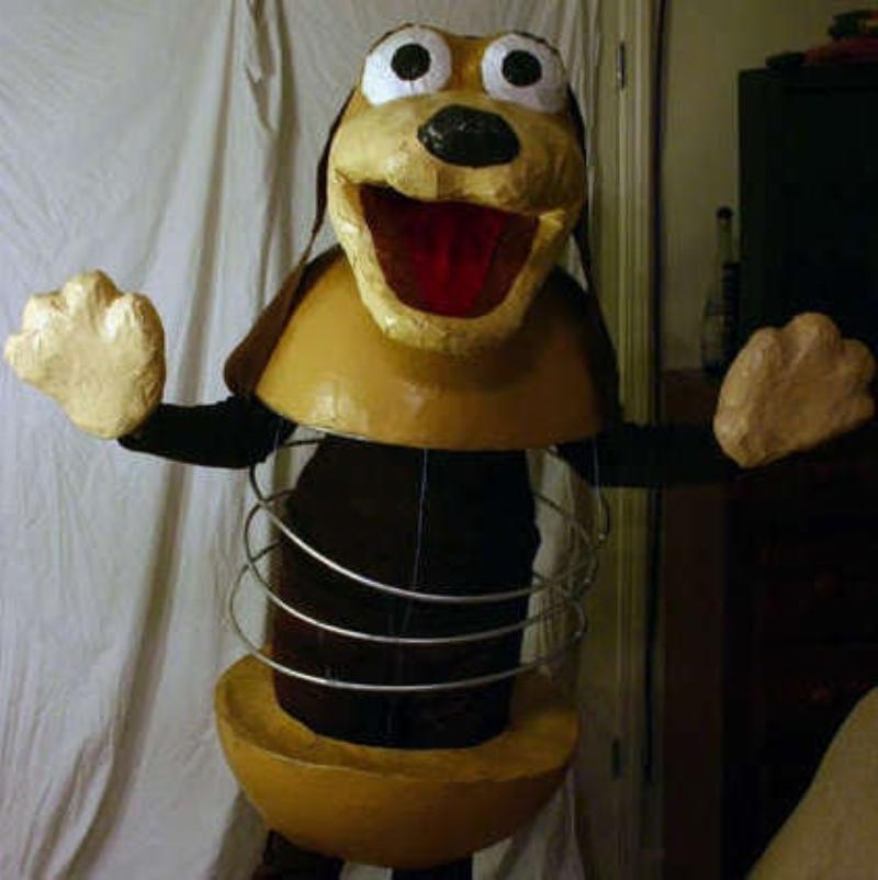 An illustration of Slinky Dog, the wiener dog character from Toy Story, with his extended spring body.