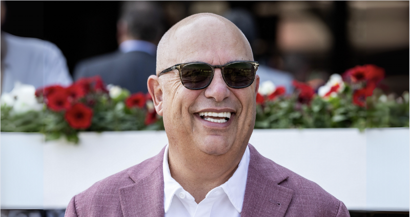 Renowned horse trainer Steve Asmussen watching his horses during a morning workout at Saratoga Race Course.