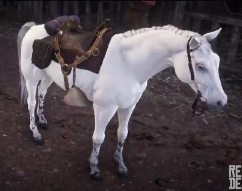 A stunning white Arabian, one of the best horses in RDR2 story mode, standing in the snowy landscape of Lake Isabella.