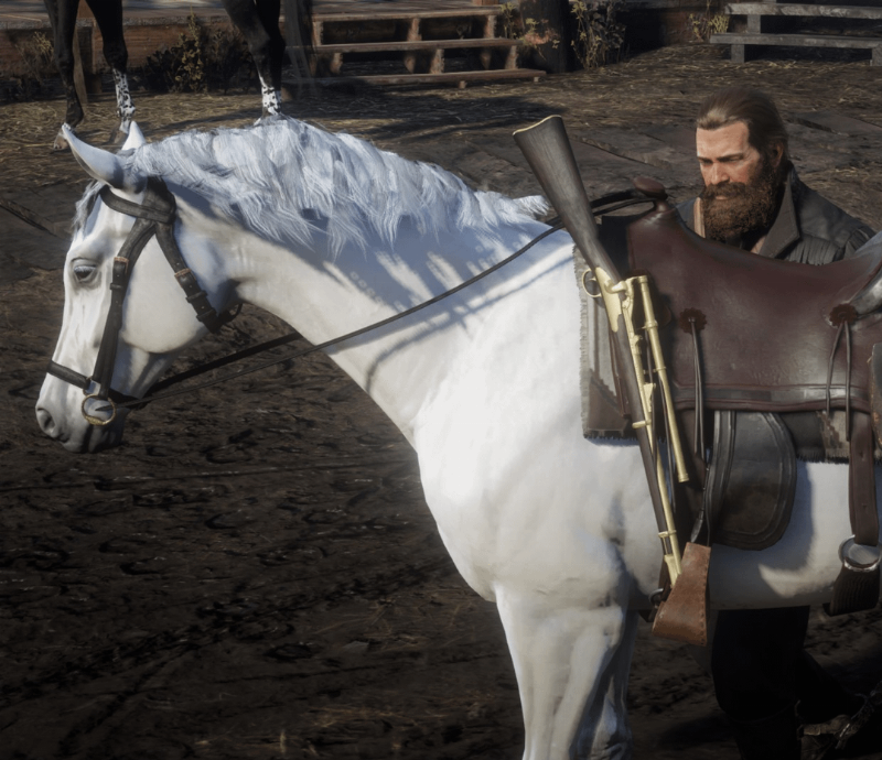The legendary White Arabian rare horse in RDR2 Story Mode standing majestically in the snow near Lake Isabella.