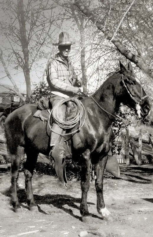 Albert Black in 1926 riding in a spade bit, rawhide reata, and long tapaderos.