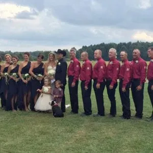 Guests singing for the couple to kiss