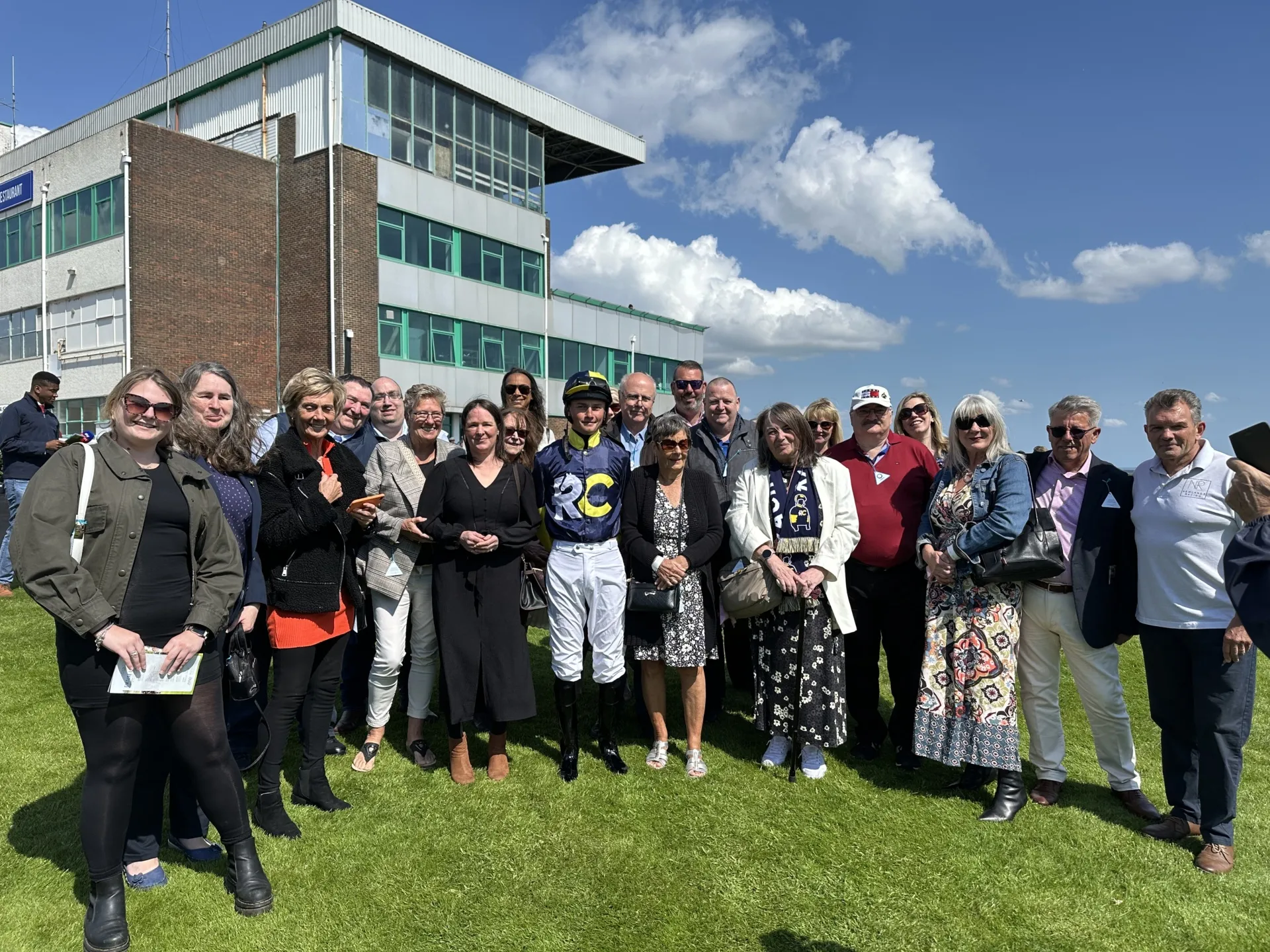 Owners celebrating at Brighton Racecourse
